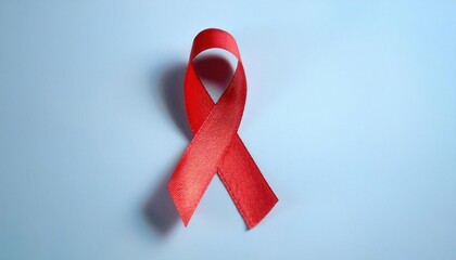 Red Ribbon of Hope. Symbolizing the Global Fight Against HIV AIDS, Advocacy for Awareness, and Unwavering Support for Those Affected, Highlighting World AIDS Day and Community Solidarity
