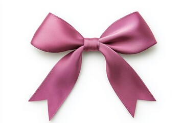 Fototapeta premium A pink ribbon bow is shown on a white background