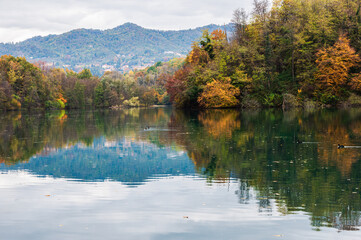 adda river during the autumnal season, lecco