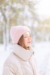 girl walking in a snowy park