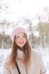 girl walking in a snowy park