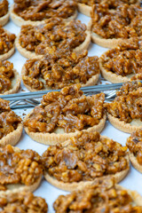 Walnuts tart cake form Perigord, Dordogne, fresh baked nuts cake on local farmers market in Saplat-du-Caneda, Perigord, France