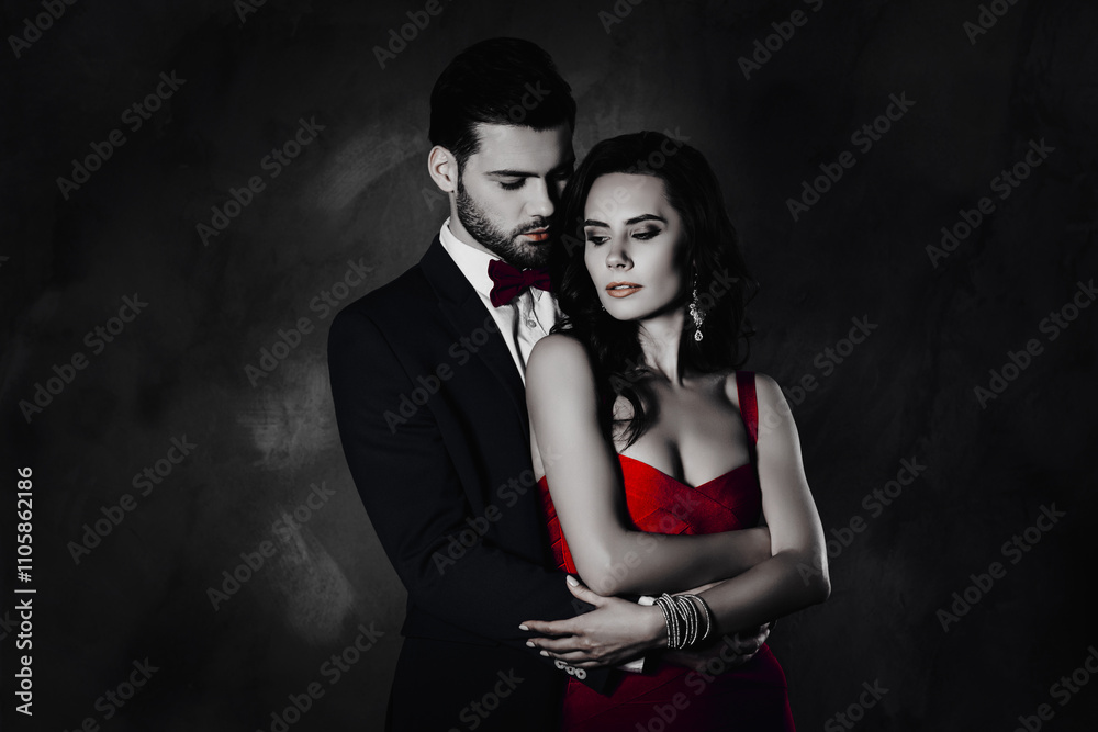 Poster portrait of naughty couple embracing looking at each other, man with bristle in tux with bowtie pret