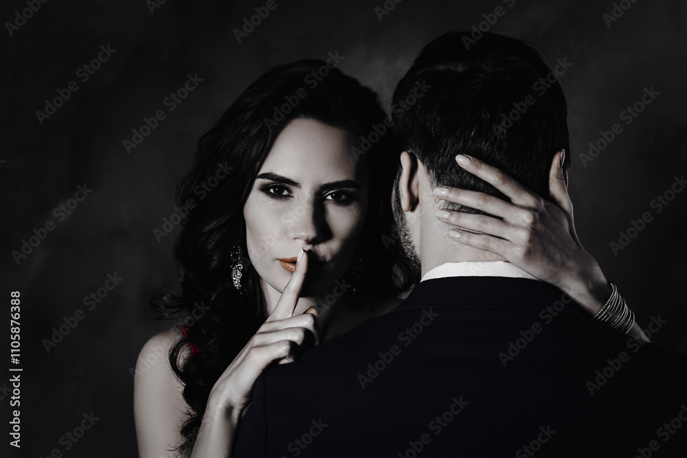 Poster portrait of tempting brunette lady showing silence sign with forefinger touching secret mysterious g