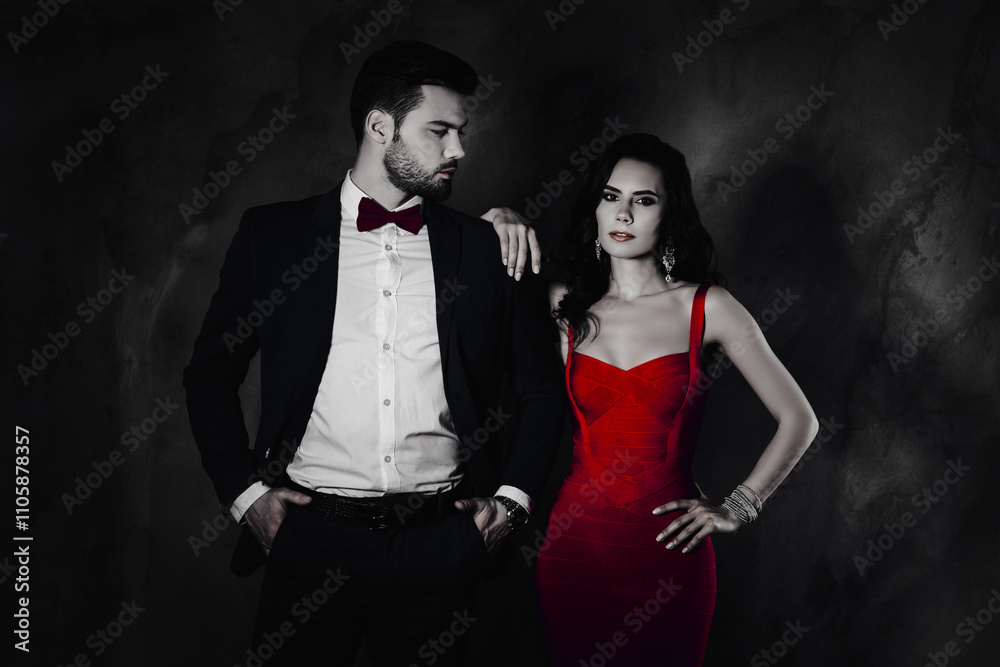 Poster profile portrait of virile cool mr in blue tux with bow holding two hands in pants looking at his ch