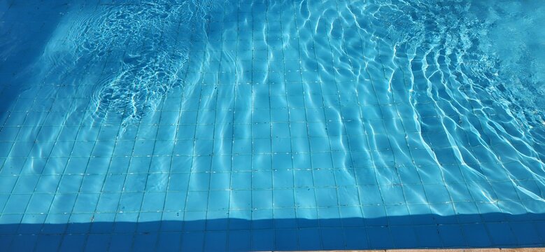 Swimming pool with small blue tiles