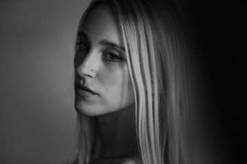 Side Profile of a Woman in Studio Lighting