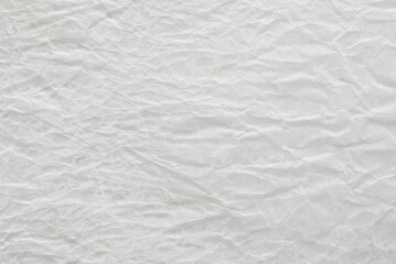 White crumpled recycled paper texture as background