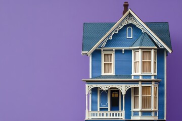 Obraz premium Blue house model against purple background with space
