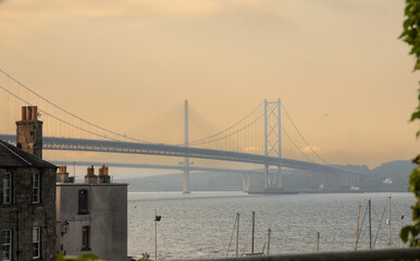 The Forth Road and Queensferry Crossing bridges span the the Firth of Forth west of central...
