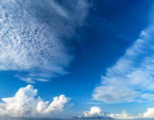 Cirrus and cumulus clouds against a blue sky