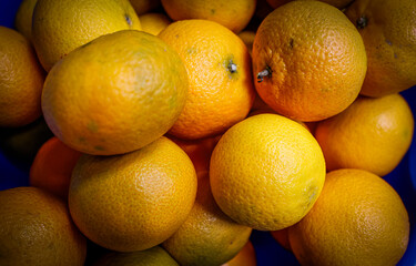Concept photos of fresh tangerines on kitchen table