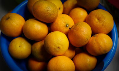 Concept photos of fresh tangerines on kitchen table