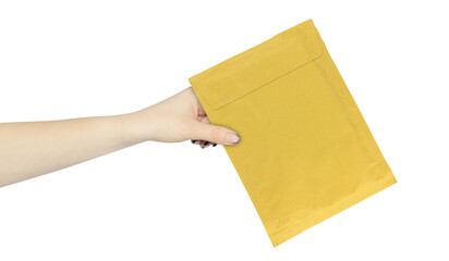 Cardboard package for document delivery, soft envelope, cardboard package, packaging paper letter in hand, outstretched hand with packaging paper letter isolated from background