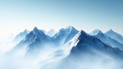 Obraz premium Majestic snow-capped mountains shrouded in mist under a clear sky.