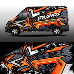 Cargo van wrap designs. Car decal. Graphic abstract orange and grey grunge stripes on black background for car branding. Modern camouflage design for car vinyl wrap.