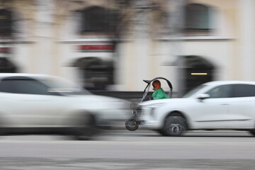 Motorcyclist in traffic on a city street