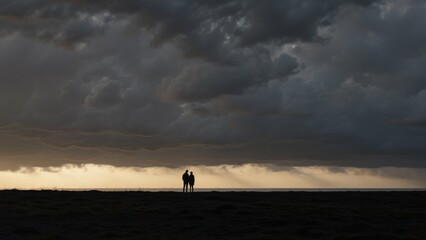 vast, dark, cloudy sky over a field