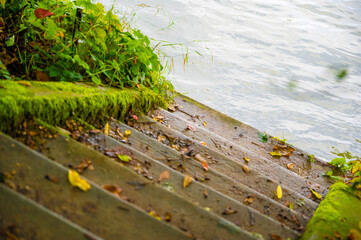 Steps leading to the water. The concept of the unknown and adventure.