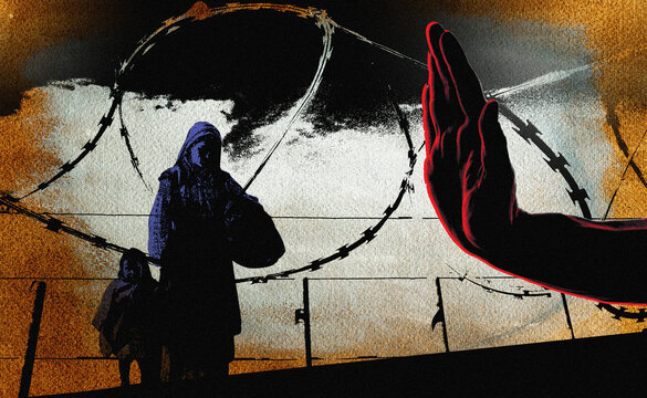 Hand stopping mother and child at razor wire border