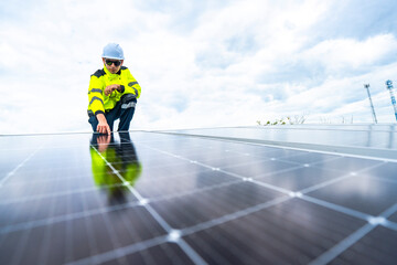 A skilled technician adjusts a solar panel on rooftop, emphasizing the transition to sustainable energy. Equipped with safety gear, the worker demonstrates precision in renewable energy installations.