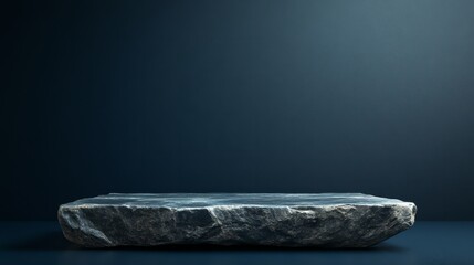 A sleek stone podium with angular edges, standing firmly on a smooth dark blue background