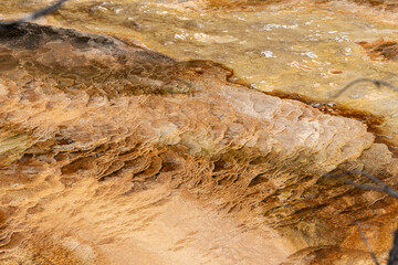 Travertine rock formations in Mammoth Hot Springs area of Yellowstone National Park