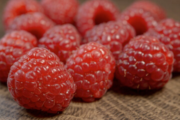 Fresh red raspberries close up. Raspberries macro shot.