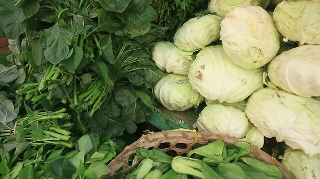 Beautifully arranged fresh vegetables at a javanese traditional market, for sale.
