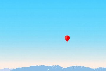 Fototapeta premium A red hot air balloon is floating in the sky above a mountain range