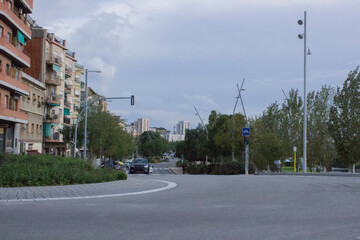 Obraz premium Cityscape; circular road in the city with cars.