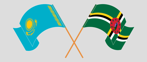 Crossed and waving flags of Kazakhstan and Dominica. Vector illustration