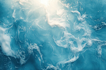 Blue and white water surface with waves under a clear sky, reflecting sunlight making the water sparkle with shifting ripples.