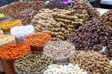 Variety of dried fruits and nuts in Moroccan market