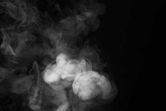 Abstract Smoke Swirls on Black Background