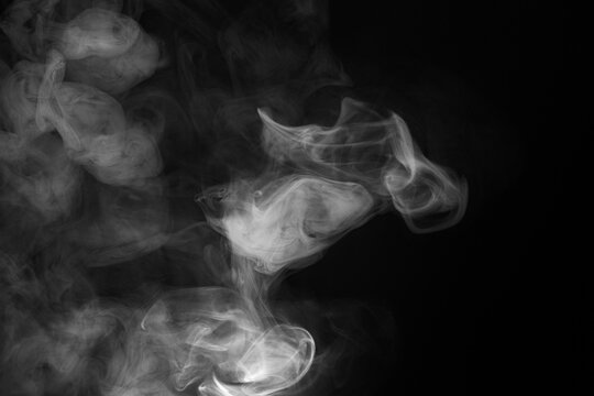 Abstract Smoke Swirls on Black Background
