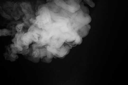 Abstract Smoke Swirls on Black Background