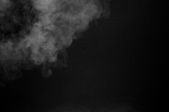 Abstract Smoke Swirls on Black Background