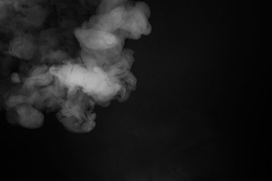 Abstract Smoke Swirls on Black Background