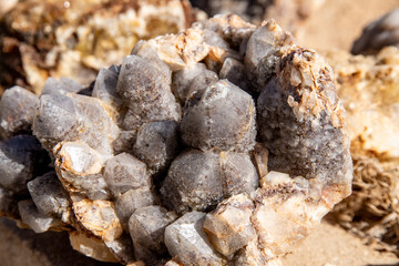 Close-up of agate stone with gray and white crystal structures