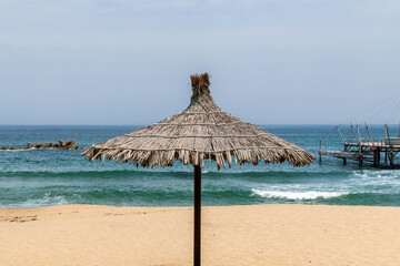 thatched parasol on the beach