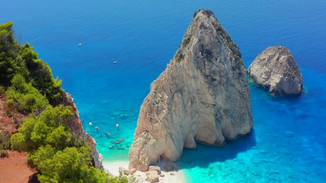 Island and beach in Greece from above. Aerial view of small Greek island the with idyllic exotic beaches and crystal clear water, Zakynthos