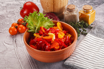 Diced raw bell red and yellow pepper