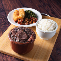 Bowl with feijoada and spices Typical Brazilian food