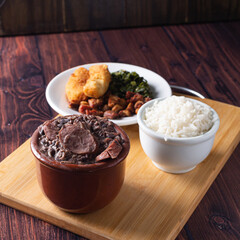Bowl with feijoada and spices Typical Brazilian food