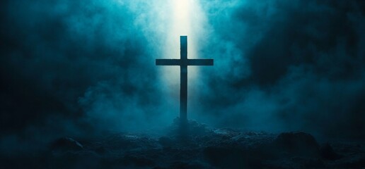 Fototapeta premium Dark cross silhouette on a misty ground, lit from above.