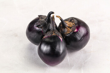 Raw violet and black eggplant