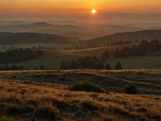 Golden sunset from Orlické Mountains with a Czech landscape.