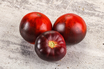 Black ripe juicy organic tomato