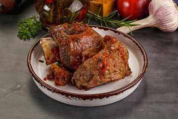 Baked beef ribs with vegetables